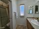 Clean bathroom with single sink vanity and shower/tub combo at 650 N Hawes Rd # 4956, Mesa, AZ 85207