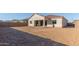 Spacious backyard showcasing a house exterior at 16399 W Avenida Del Sol --, Surprise, AZ 85387