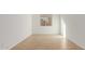 Empty bedroom featuring tile flooring and a window at 16399 W Avenida Del Sol --, Surprise, AZ 85387
