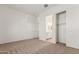 Spacious bedroom with carpet, private bathroom access and closet at 16399 W Avenida Del Sol --, Surprise, AZ 85387