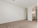Large bedroom with plush carpeting and access to full bathroom at 16399 W Avenida Del Sol --, Surprise, AZ 85387