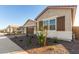 Exterior view of home with garage and landscaping at 16399 W Avenida Del Sol --, Surprise, AZ 85387