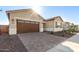 House exterior showcasing the front entrance at 16399 W Avenida Del Sol --, Surprise, AZ 85387