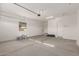 Attached two-car garage with convenient access door and ample space at 21726 E Lords Way, Queen Creek, AZ 85142