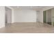 Bright and airy living room with access to a sliding glass door at 21726 E Lords Way, Queen Creek, AZ 85142