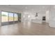 Open-concept living area with sliding glass doors leading to the backyard at 21726 E Lords Way, Queen Creek, AZ 85142