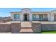 Stunning curb appeal with brickwork and a fountain at 10147 W Camino De Oro --, Peoria, AZ 85383