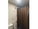Bathroom with shower, curtain and damaged wall at 1535 E Christy Dr, Phoenix, AZ 85020