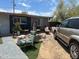 Front yard with seating area and landscaping at 1535 E Christy Dr, Phoenix, AZ 85020
