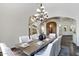 Formal dining room with a large wood table and white chairs at 4327 E Capricorn Pl, Chandler, AZ 85249