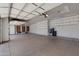 Spacious garage with overhead storage and epoxy flooring at 4327 E Capricorn Pl, Chandler, AZ 85249