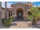 Elegant entryway featuring a wrought iron gate and stonework at 4327 E Capricorn Pl, Chandler, AZ 85249