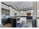 Game room features a wet bar, pool table, and seating area at 4327 E Capricorn Pl, Chandler, AZ 85249