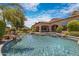 Luxury backyard oasis featuring a large pool and spa at 4327 E Capricorn Pl, Chandler, AZ 85249
