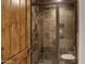 Modern shower with dark stone tile and glass enclosure at 4327 E Capricorn Pl, Chandler, AZ 85249