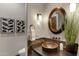 Elegant bathroom with copper sink and tiled accents at 4327 E Capricorn Pl, Chandler, AZ 85249