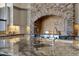 Kitchen detail, granite island with dual sinks and stone backsplash at 4327 E Capricorn Pl, Chandler, AZ 85249