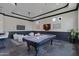 Game room boasts a pool table and comfortable seating at 4327 E Capricorn Pl, Chandler, AZ 85249
