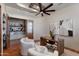 Home office with built-in shelves and hardwood floors, creating a productive workspace at 4327 E Capricorn Pl, Chandler, AZ 85249