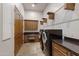 Convenient laundry room with washer, dryer, and cabinets at 4327 E Capricorn Pl, Chandler, AZ 85249