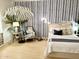 Beach-themed bedroom with a queen bed and calming decor at 3852 E Expedition Way, Phoenix, AZ 85050