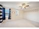 Spacious bedroom with nautical-themed decor and ceiling fan at 3852 E Expedition Way, Phoenix, AZ 85050