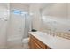Bathroom with single sink vanity, shower/tub combo at 3852 E Expedition Way, Phoenix, AZ 85050