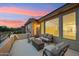 Relaxing rooftop deck with seating area and sunset views at 3852 E Expedition Way, Phoenix, AZ 85050