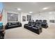 Home theater with reclining seats and large screen at 3852 E Expedition Way, Phoenix, AZ 85050