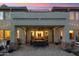 Covered patio with dining area and string lights at 3852 E Expedition Way, Phoenix, AZ 85050