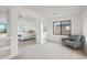Spacious main bedroom with sitting area and ensuite bath at 3852 E Expedition Way, Phoenix, AZ 85050