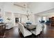 Spacious dining room with hardwood floors and a large chandelier at 3852 E Expedition Way, Phoenix, AZ 85050