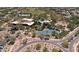 Aerial view of Aviano community clubhouse, pool, and tennis courts at 3852 E Expedition Way, Phoenix, AZ 85050
