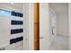 Clean bathroom with a shower/tub and linen closet at 3852 E Expedition Way, Phoenix, AZ 85050