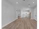 Large living area with wood floors and open kitchen concept at 26761 S 181St Pl, Queen Creek, AZ 85142
