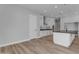 Modern white kitchen with stainless steel appliances at 26761 S 181St Pl, Queen Creek, AZ 85142