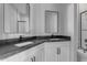 Modern bathroom with double vanity and dark countertop at 26761 S 181St Pl, Queen Creek, AZ 85142