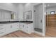 Modern bathroom boasts double vanity, walk-in shower, and ample storage at 26761 S 181St Pl, Queen Creek, AZ 85142