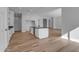 Open concept kitchen with white cabinets and island at 26761 S 181St Pl, Queen Creek, AZ 85142