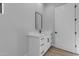 Stylish bathroom with white vanity and black accents at 26761 S 181St Pl, Queen Creek, AZ 85142