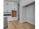 Modern kitchen with white cabinets and a built in pantry at 26761 S 181St Pl, Queen Creek, AZ 85142