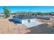 Aerial view of a new home with a large three-car garage and surrounding desert landscape at 26761 S 181St Pl, Queen Creek, AZ 85142