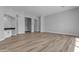 Bright and airy living room with wood-look floors at 26761 S 181St Pl, Queen Creek, AZ 85142