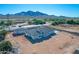 Aerial view showcasing a new construction home's rear elevation, highlighting its design and landscape at 26761 S 181St Pl, Queen Creek, AZ 85142