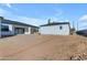 View of the rear of the house and the large backyard at 26761 S 181St Pl, Queen Creek, AZ 85142