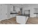 Modern kitchen with white cabinets and dark countertop at 26761 S 181St Pl, Queen Creek, AZ 85142