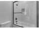 Clean bathroom with shower/tub combo and white tile at 26761 S 181St Pl, Queen Creek, AZ 85142