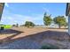 Large lot with gravel and dirt, showing potential for landscaping at 26761 S 181St Pl, Queen Creek, AZ 85142