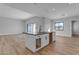 Modern kitchen island with white cabinets and quartz countertops at 26761 S 181St Pl, Queen Creek, AZ 85142