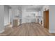 Spacious kitchen with white cabinets and wood flooring at 26761 S 181St Pl, Queen Creek, AZ 85142